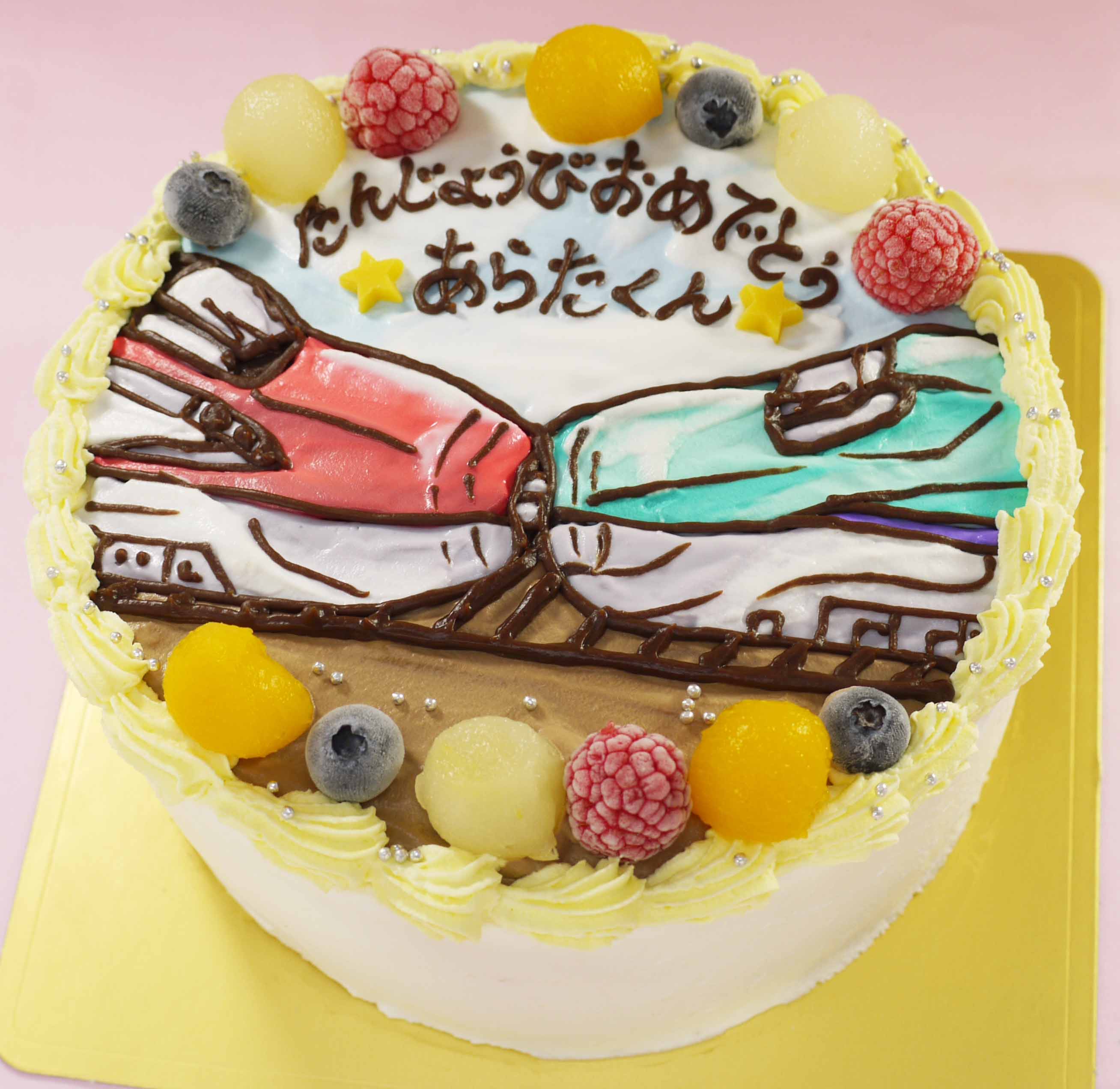 連結した新幹線のイラストケーキ